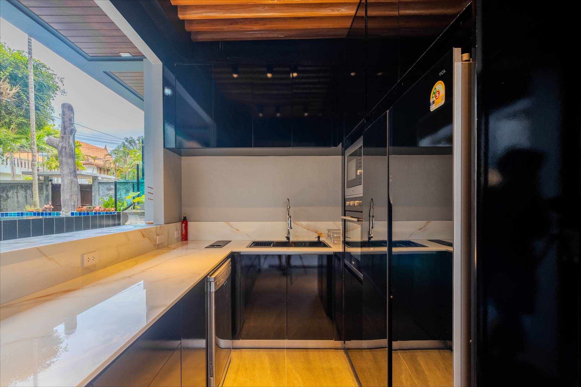 Professional-grade estate kitchen with modern appliances where the private chef prepares bespoke cuisine
